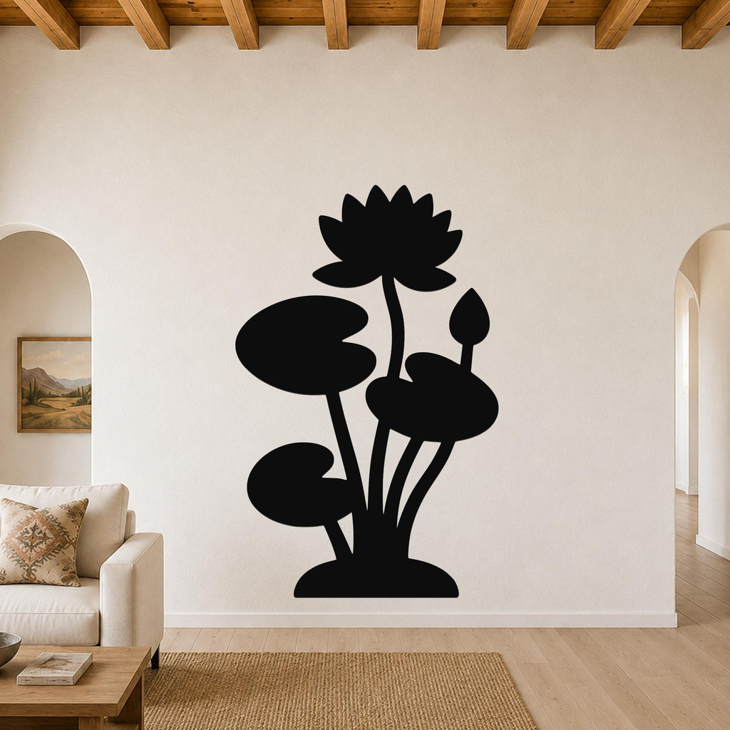 Black metal wall art silhouette of a lotus and water lilies, mounted on a living room wall above a sofa.