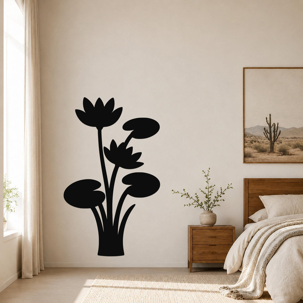 Black metal wall art silhouette of lotus flowers and lily pads, mounted on a bedroom wall above a wooden nightstand.