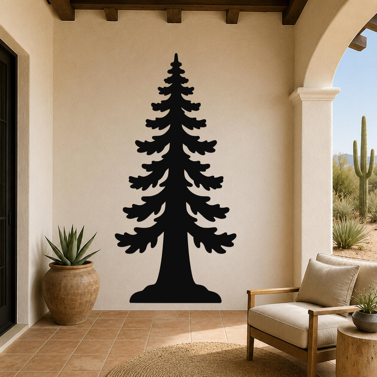 Black metal sequoia tree wall art with layered branch cutouts, mounted on a beige stucco wall in a patio setting with a wooden chair and potted plant nearby.