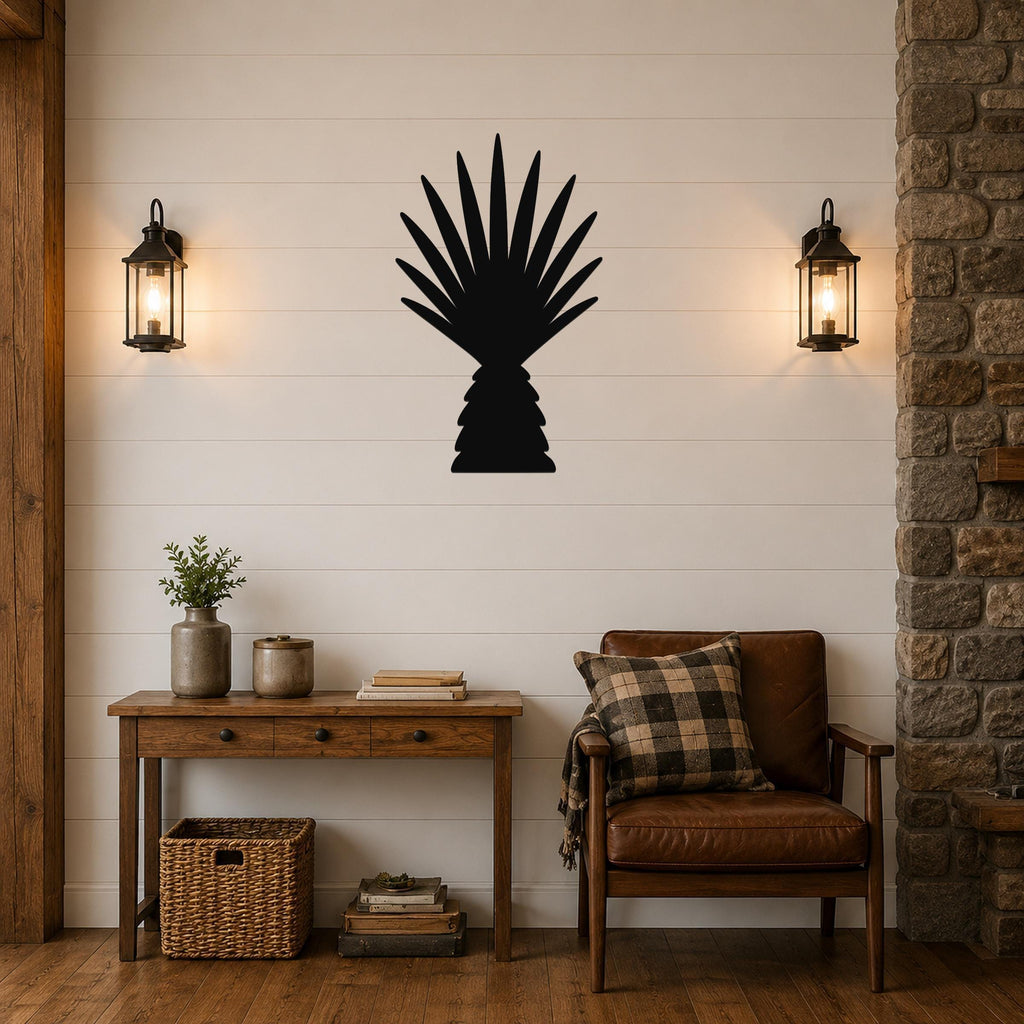 Black metal wall art silhouette of a fan palm tree, mounted on a shiplap wall above a wooden console table in a living room.