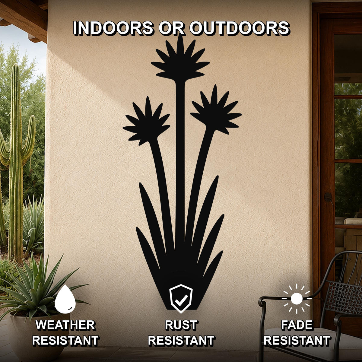 Black metal yucca wall art with blooming flower cutouts, mounted on an outdoor patio wall, weather, rust, and fade resistant.
