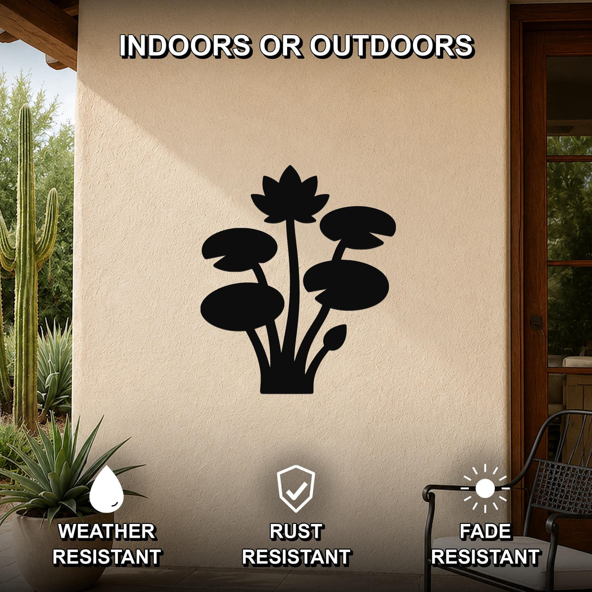 Black metal lotus water lily wall art with a silhouette design of flowers and leaves, mounted on an outdoor patio wall.