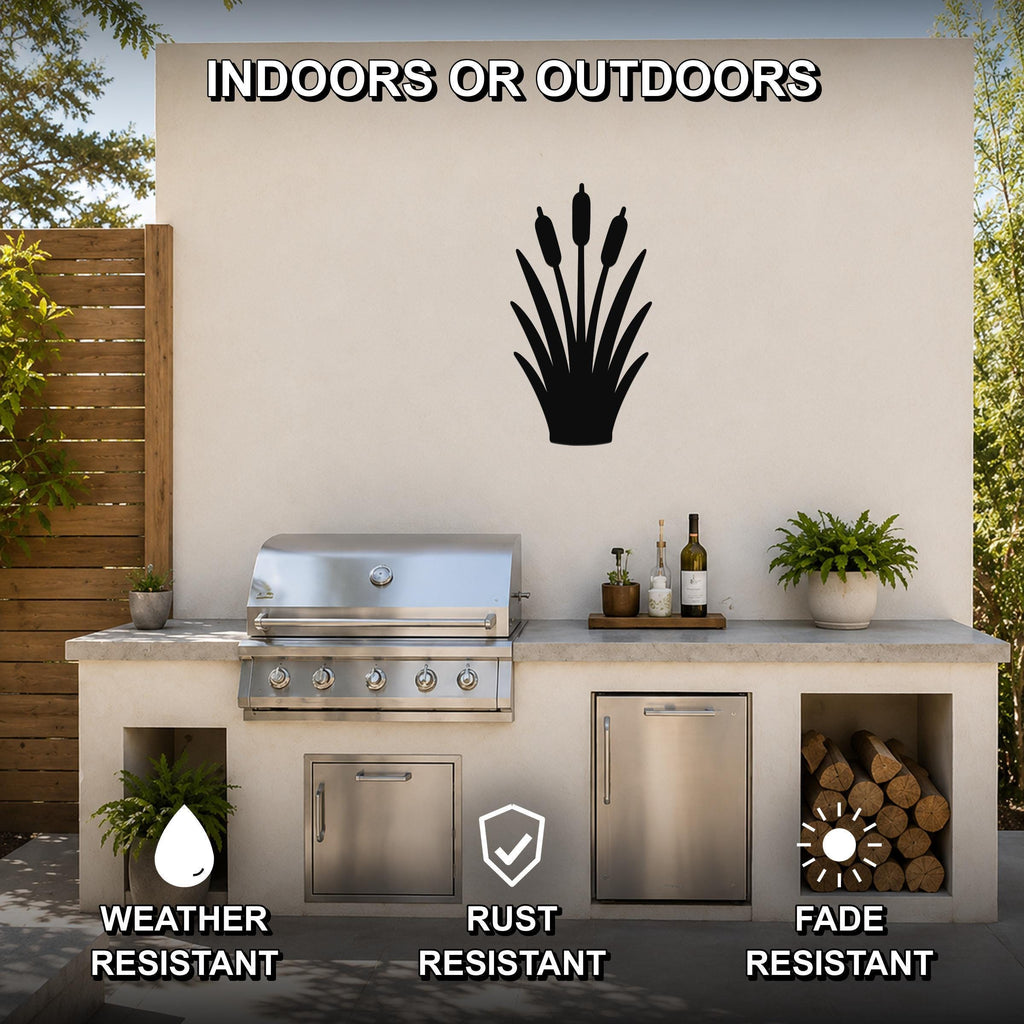 Black metal cattail wall art silhouette mounted on an outdoor patio wall above a grill and counter, weather, rust, and fade resistant.