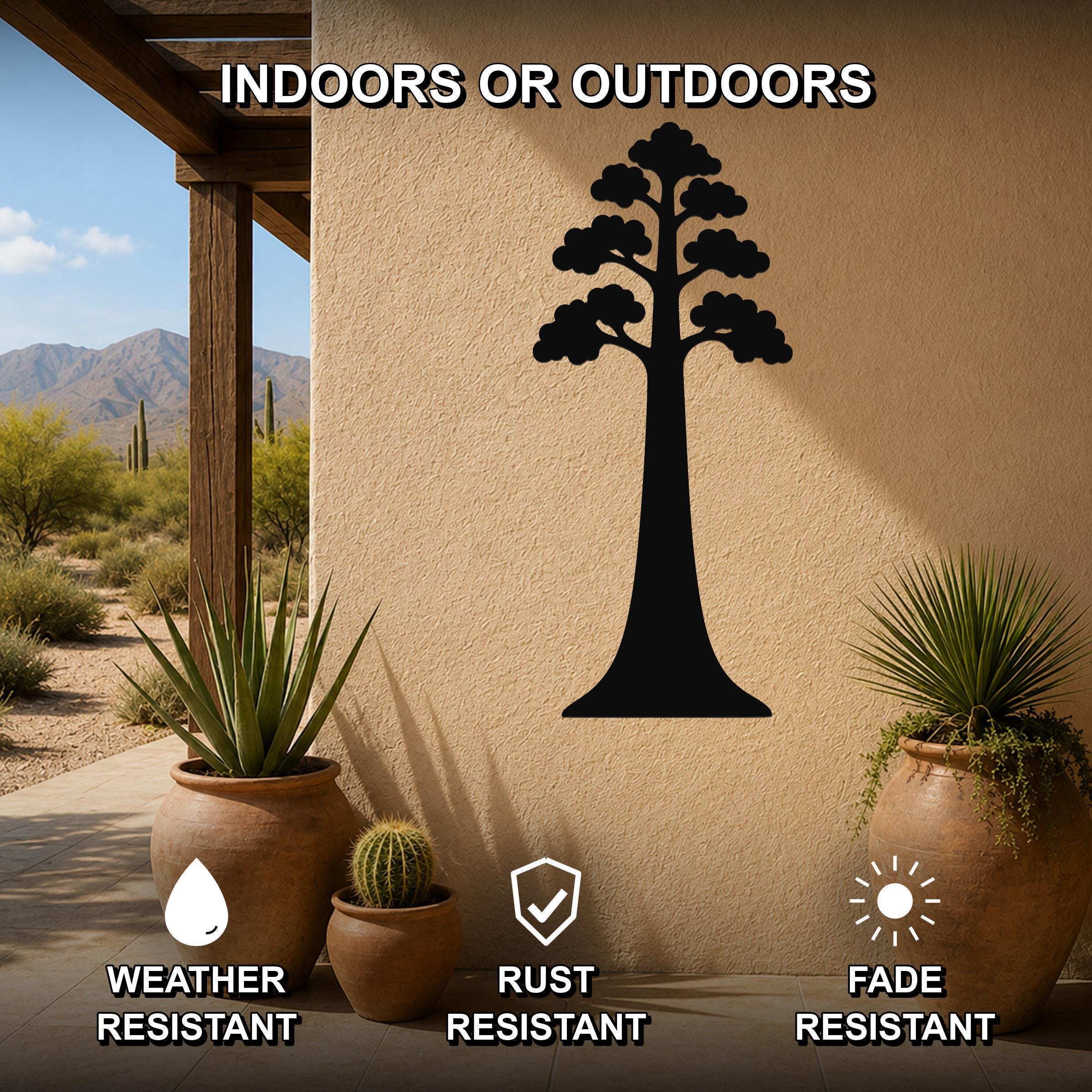 Black metal sequoia tree wall art silhouette mounted on an outdoor patio wall, weather resistant, rust resistant, and fade resistant, with potted plants nearby.