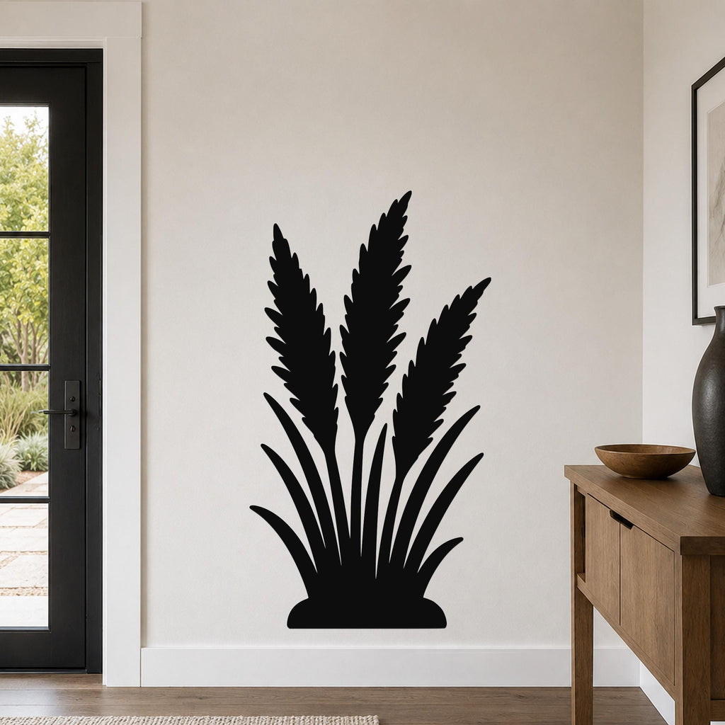 Black metal wall art in a wild grass silhouette design, mounted on a light-colored wall in a modern entryway.