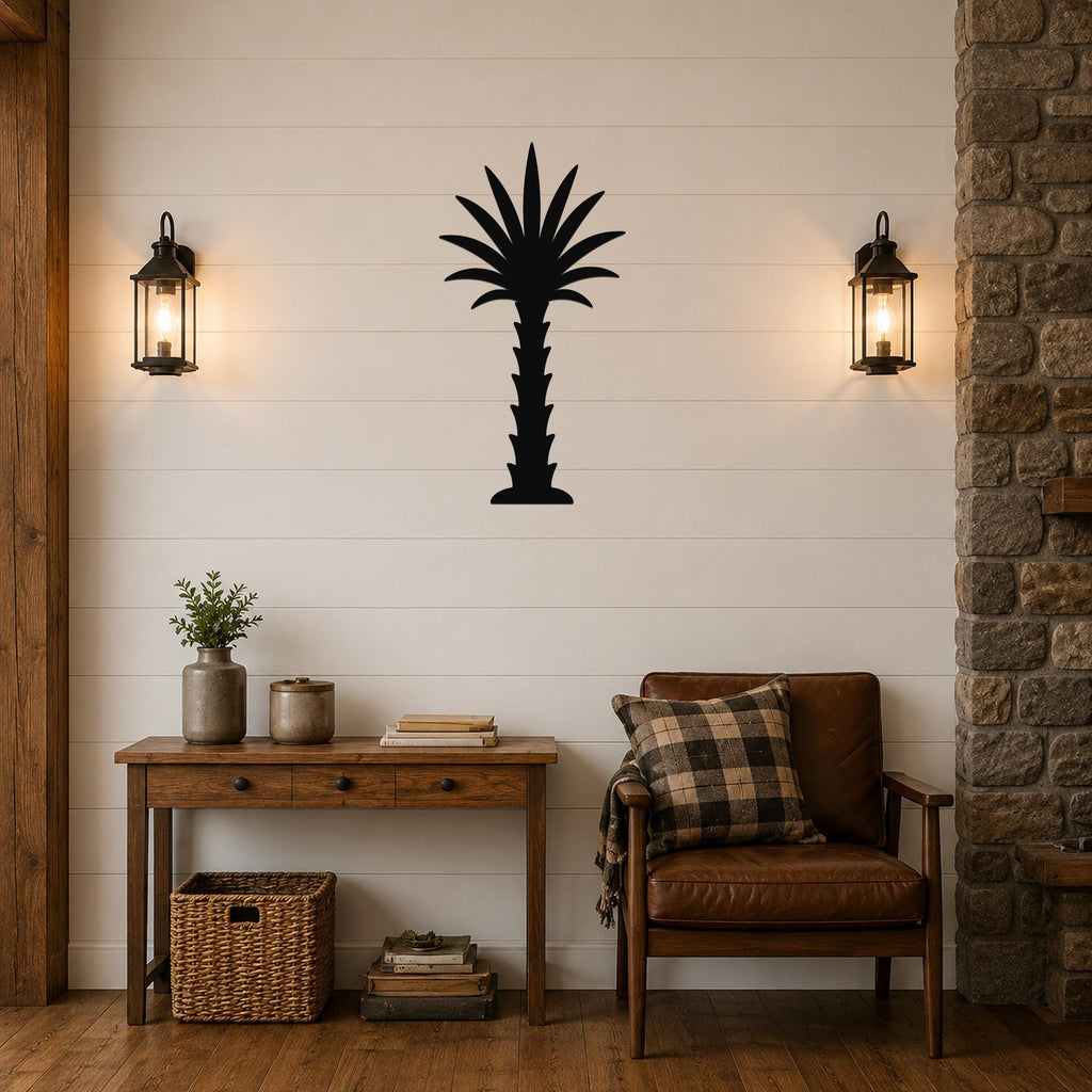 Black metal palm tree wall art silhouette mounted on a shiplap wall above a wooden console table in a living room.