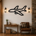 Black metal airplane wall art silhouette mounted on a shiplap wall above a wooden console table in a living room.