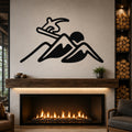 Black metal wall art with a snowboarder silhouette above a mountain range, mounted above a fireplace in a living room.