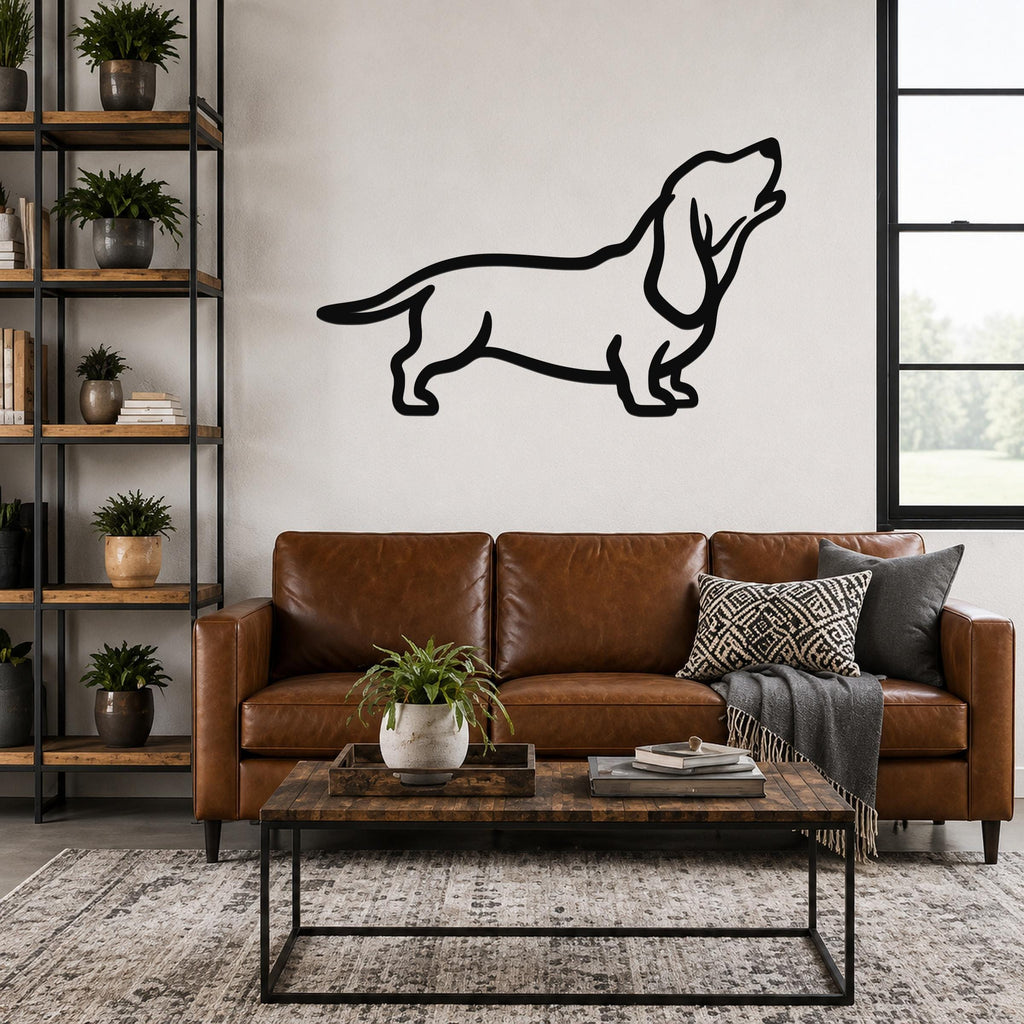 Black metal Basset Hound silhouette wall art mounted above a brown leather sofa in a living room.