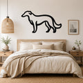Black metal Borzoi dog wall art silhouette mounted above a wooden bed in a neutral bedroom.
