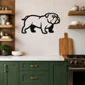 Black metal bulldog wall art silhouette mounted on a white tiled kitchen wall above a counter.