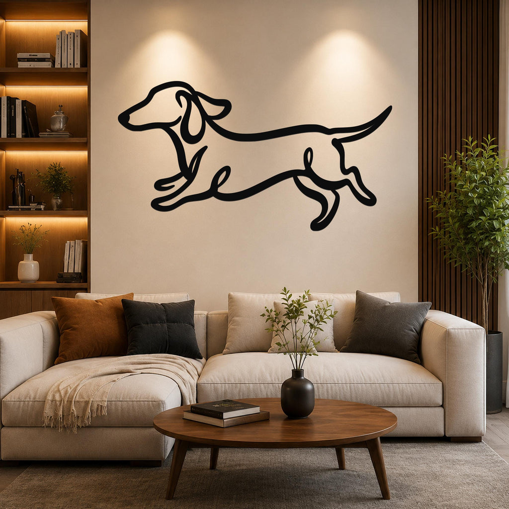 Black metal dachshund wall art with bold line cutout design, mounted above a beige sofa in a living room.