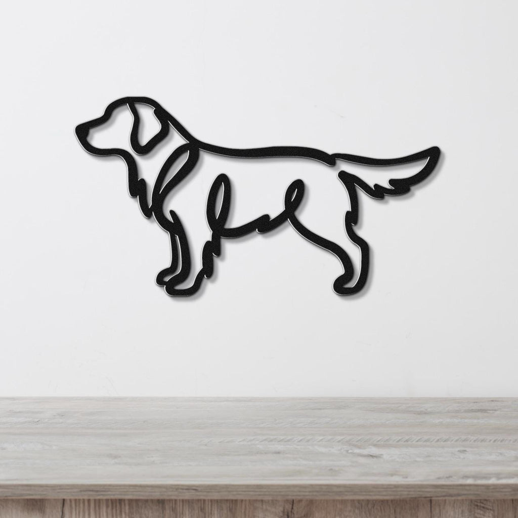Black metal wall art in the silhouette of a standing dog, mounted on a white wall above a light wood surface.