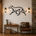 Black metal greyhound wall art with motion-line cutouts, mounted above a wooden console table in a living room.