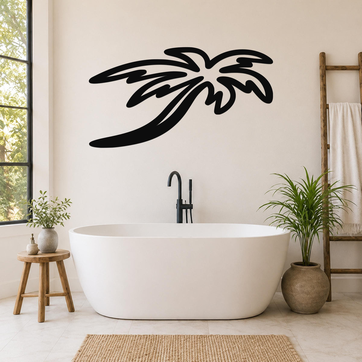 Black metal palm tree wall art with flowing frond cutouts, mounted on a bathroom wall above a freestanding tub.