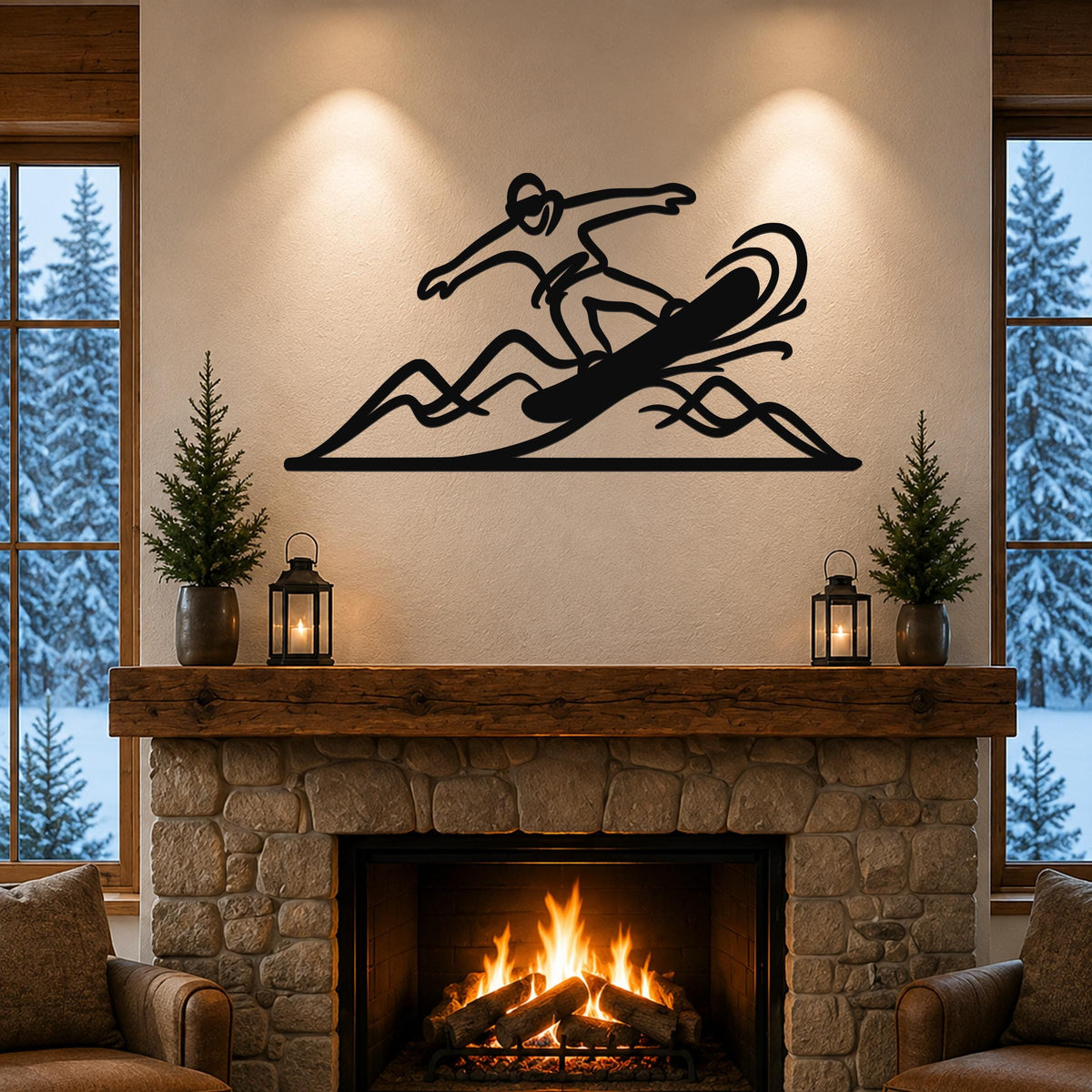 Black metal wall art silhouette of a snowboarder in motion above a stone fireplace, mounted on a beige wall between two windows with snowy trees outside.