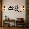 Black metal wall art featuring a skier silhouette and mountain peaks, mounted on a shiplap wall above a wooden console table in a rustic living room.
