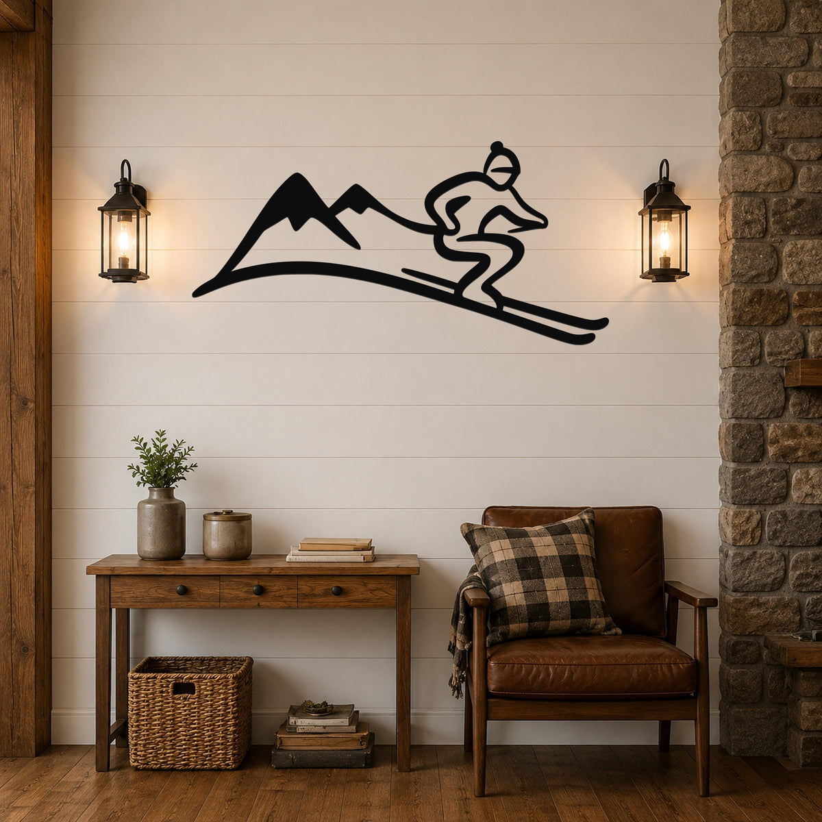 Black metal wall art featuring a skier silhouette and mountain peaks, mounted on a shiplap wall above a wooden console table in a rustic living room.