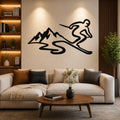 Black metal wall art featuring a skier silhouette and mountain range, mounted above a beige sofa in a living room.