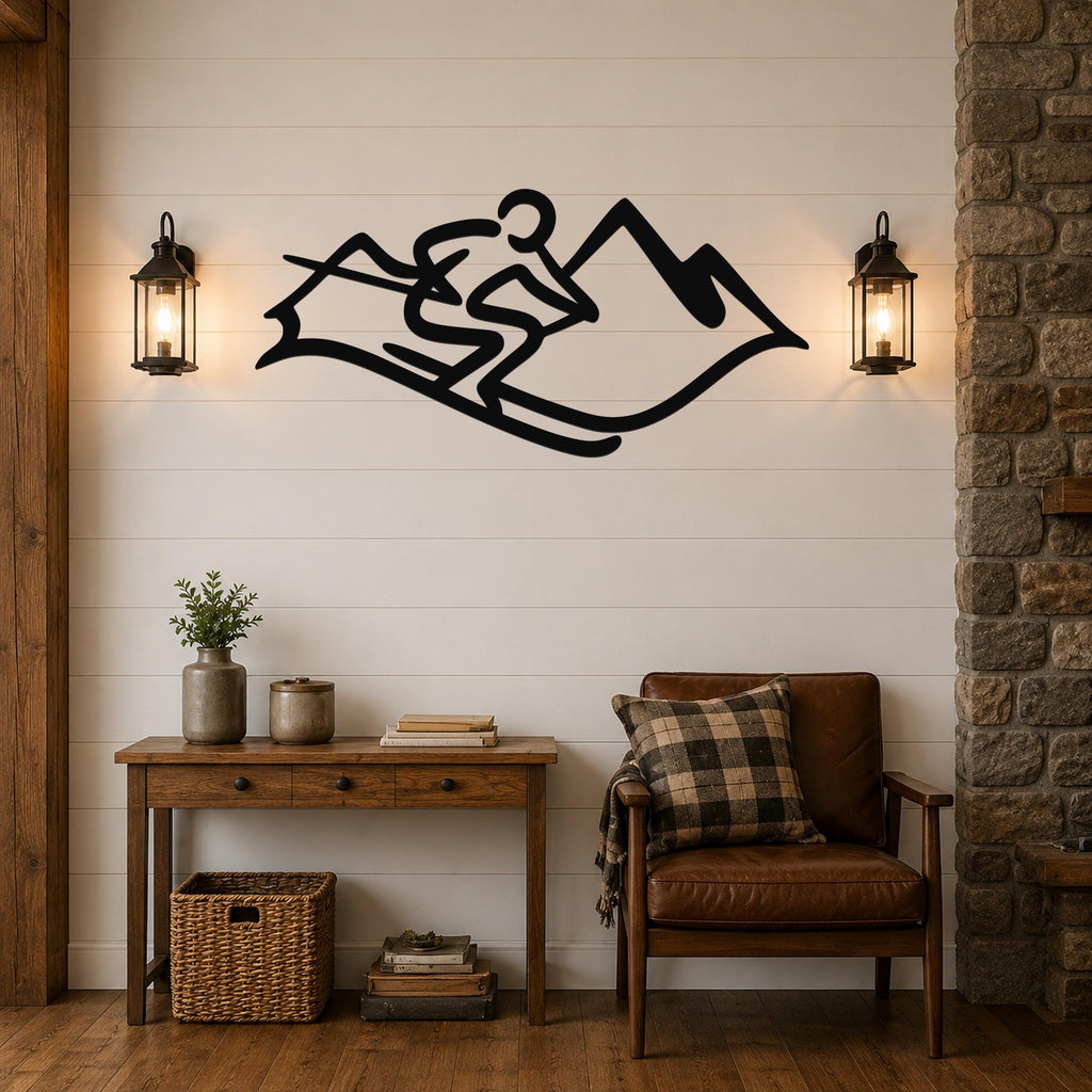 Black metal wall art featuring a skier silhouette and mountain peaks, mounted on a shiplap wall above a wooden console table in a rustic living room.