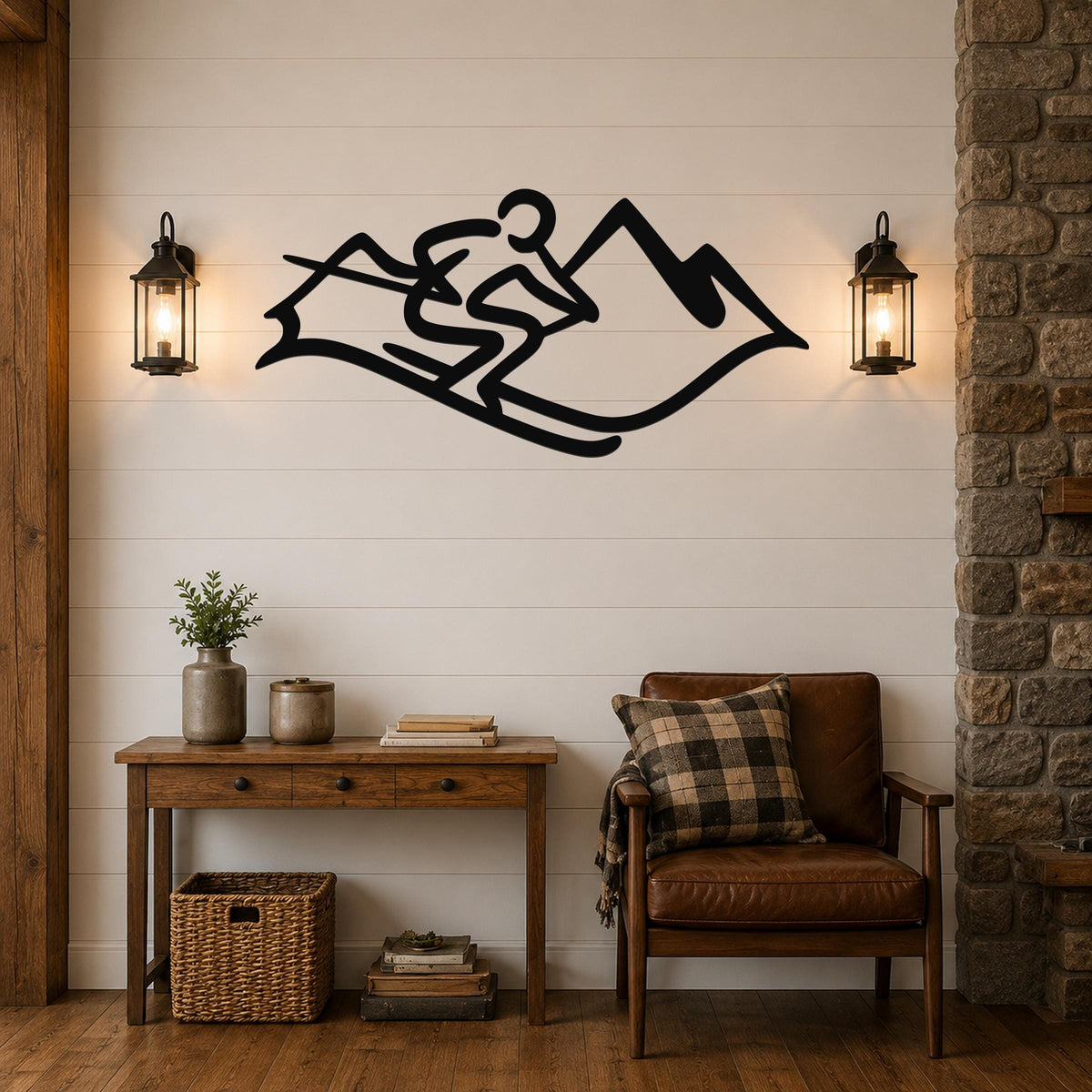 Black metal wall art featuring a skier silhouette and mountain peaks, mounted on a shiplap wall above a wooden console table in a rustic living room.