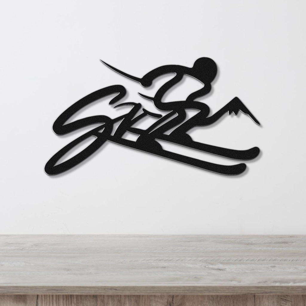 Black metal wall art featuring a skier silhouette with mountain peaks and the word "SKI" in cursive, mounted on a white wall above a wooden surface.