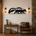 Black metal skunk wall art with a striped tail silhouette, mounted on a white shiplap wall above a wooden console table in a living room.