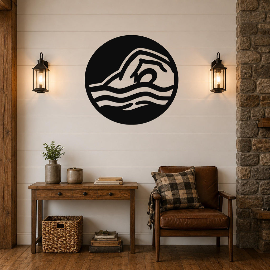 Black metal wall art with a swimmer silhouette in fluid motion, mounted on a shiplap wall above a wooden console table in a living room.