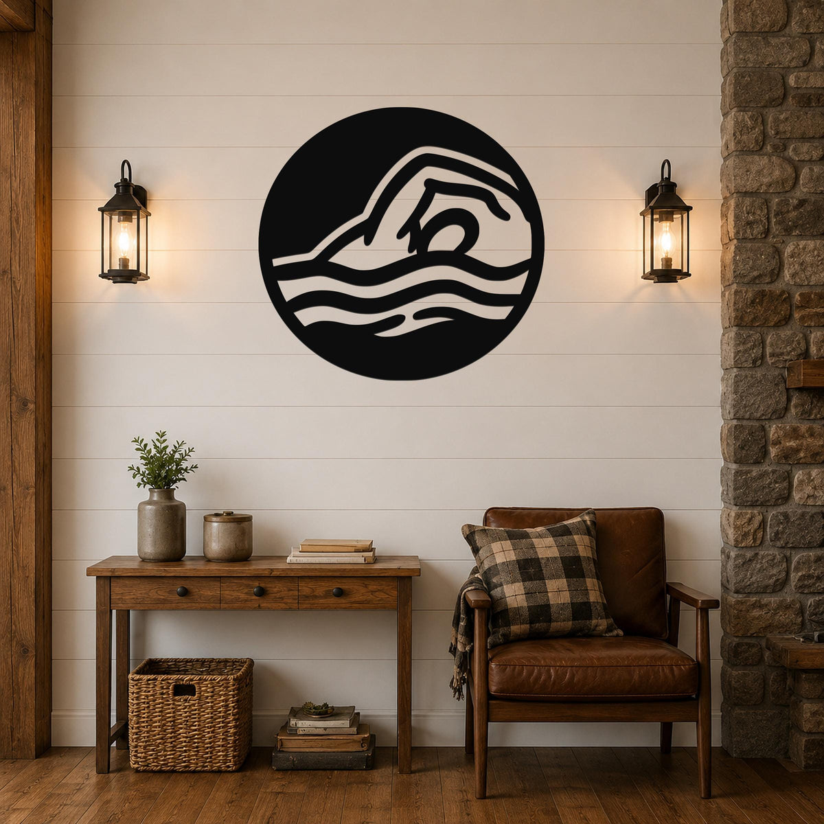 Black metal wall art with a swimmer silhouette in fluid motion, mounted on a shiplap wall above a wooden console table in a living room.