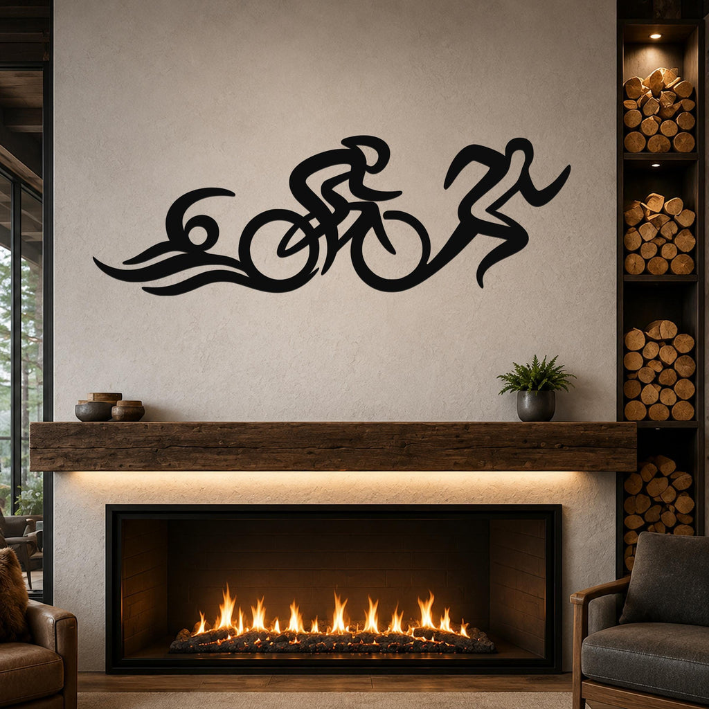 Black metal triathlon wall art with flowing silhouette of swim, bike, and run figures, mounted above a fireplace in a living room.