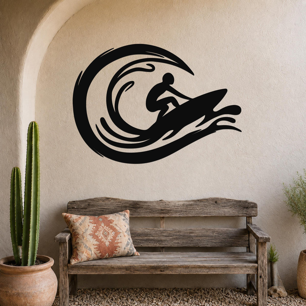 Black metal surfer wall art with wave cutouts, mounted above a wooden bench in a coastal-style entryway.