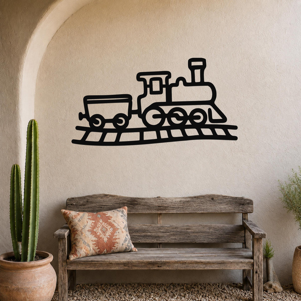 Black metal train wall art with a classic locomotive and car silhouette, mounted on a textured beige wall above a rustic wooden bench in a sunlit entryway.