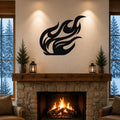 Black metal flame wall art with flowing silhouette cutouts, mounted above a stone fireplace in a cozy living room.