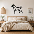Black metal Boxer dog silhouette wall art mounted above a bed in a neutral bedroom.