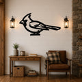 Black metal cardinal wall art silhouette mounted on a shiplap wall above a wooden console table in a rustic living room.