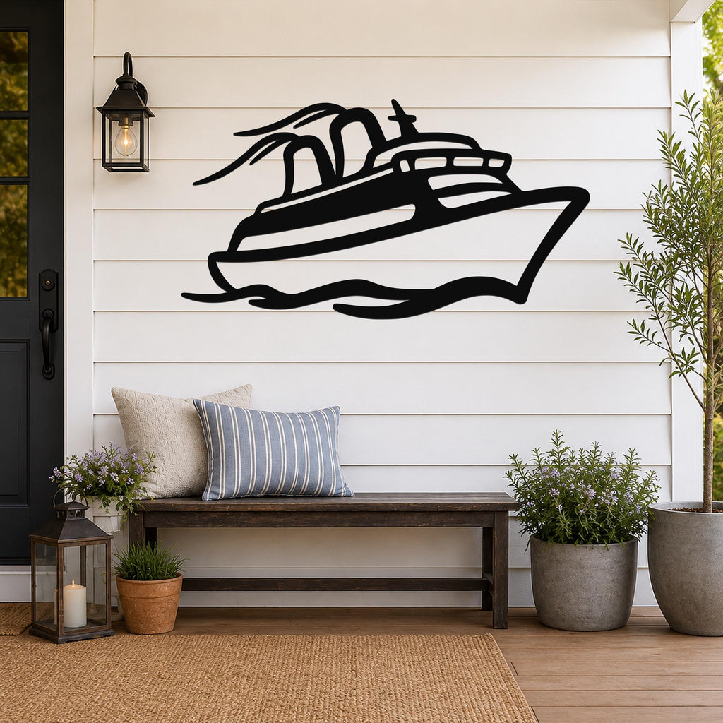 Black metal cruise ship wall art with motion-line cutouts, mounted on a white shiplap wall above a wooden bench on a porch.
