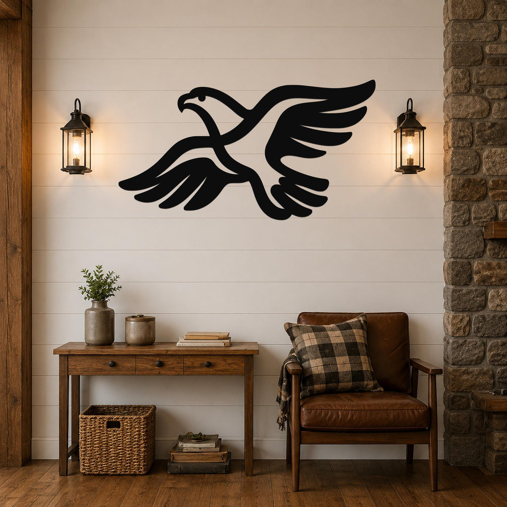 Black metal eagle wall art with a bold silhouette and extended wings, mounted on a shiplap wall above a wooden console table in a living room.