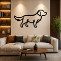 Black metal dog silhouette wall art mounted on a living room wall above a beige sofa, with warm lighting and a wooden bookshelf to the left.