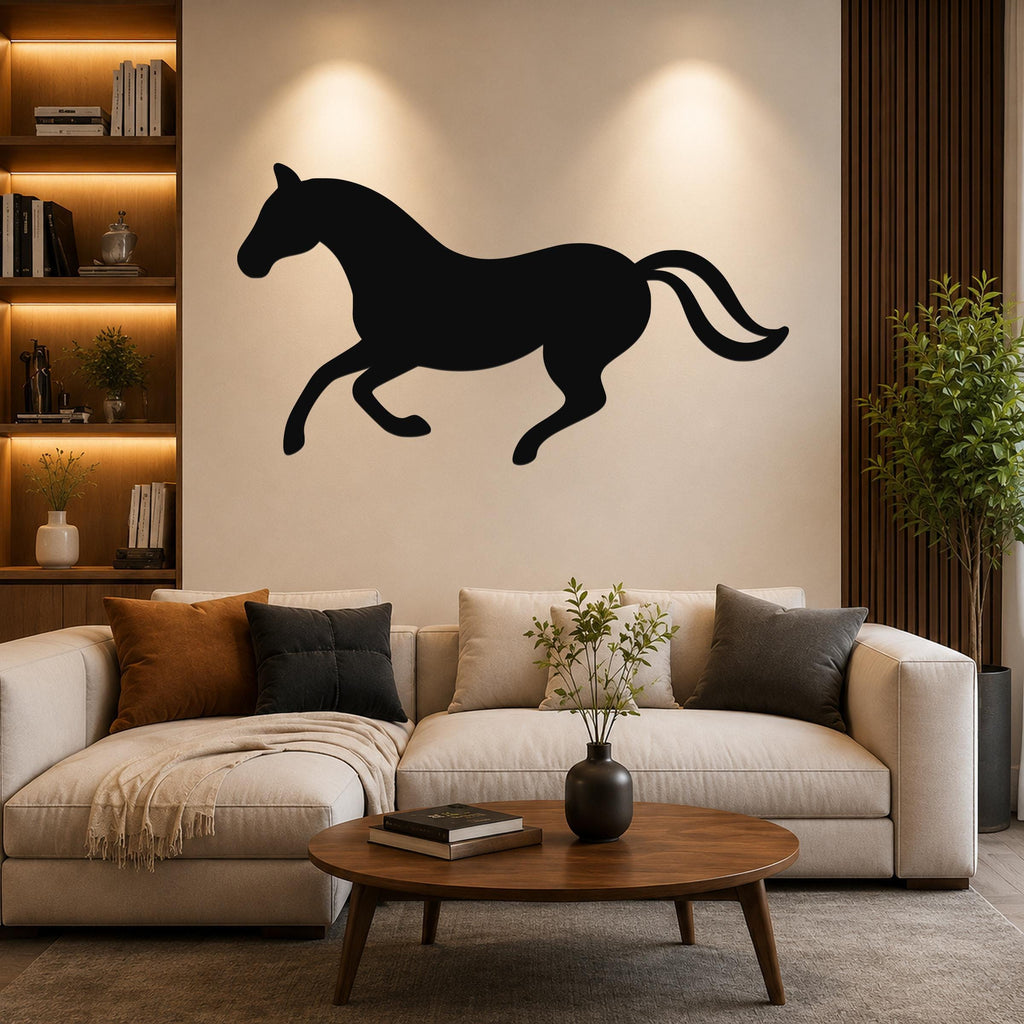 Black metal horse wall art silhouette in a running pose, mounted on a living room wall above a beige sofa.