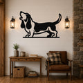 Black metal wall art of a howling basset hound silhouette, mounted on a shiplap wall above a wooden console table in a living room.