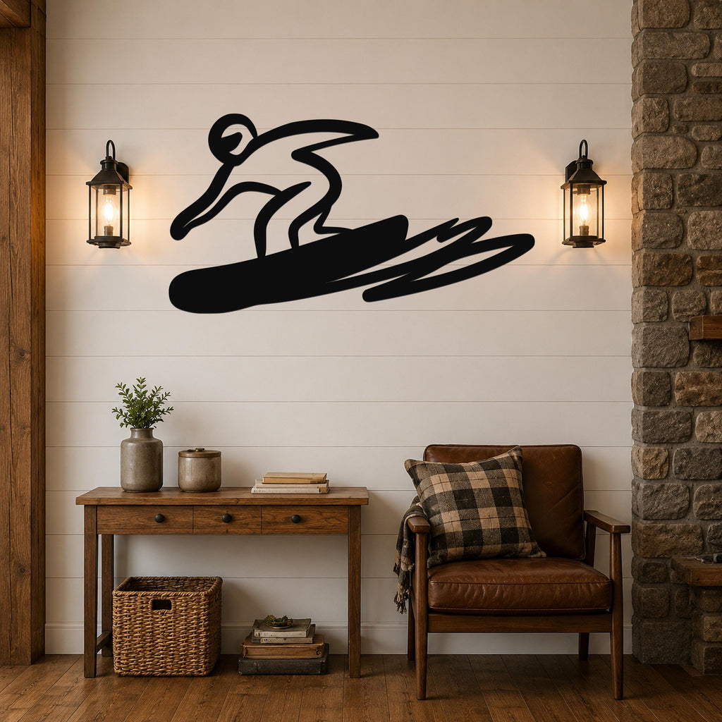 Black metal wall art silhouette of a snowboarder in motion, mounted on a shiplap wall above a wooden console table in a living room.