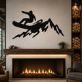 Black metal wall art silhouette of a snowboarder on a mountain, mounted above a fireplace in a living room.