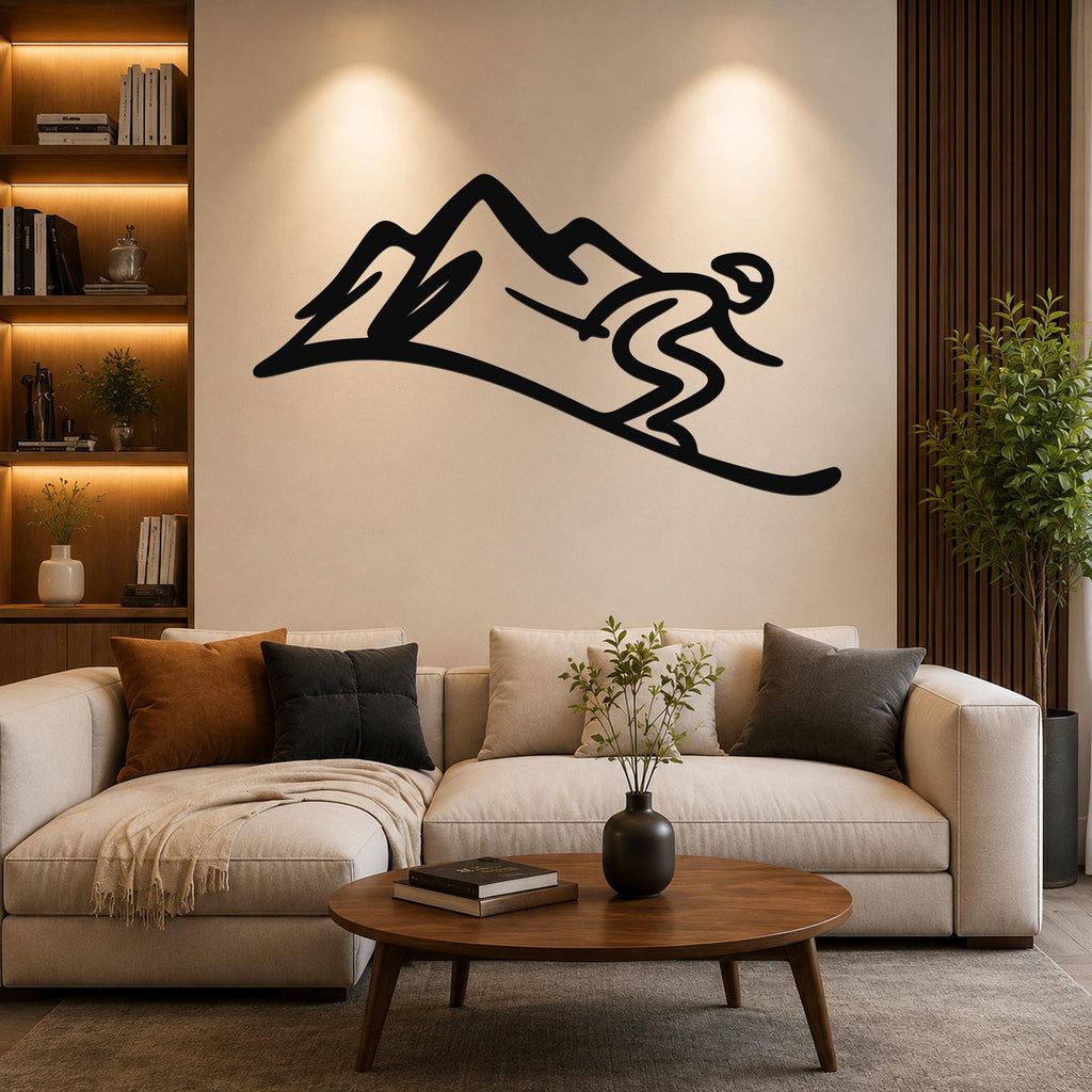 Black metal wall art featuring a skier silhouette descending a mountain, mounted above a sofa in a living room.