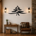 Black metal pine tree wall art with layered branch cutouts, mounted on a shiplap wall above a wooden console table in a rustic living room.