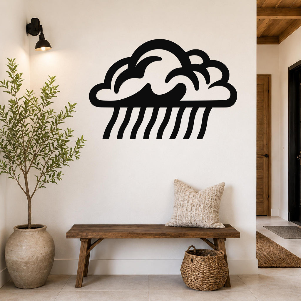 Black metal rain cloud wall art with raindrop cutouts, mounted on a white wall above a wooden bench in a modern entryway.