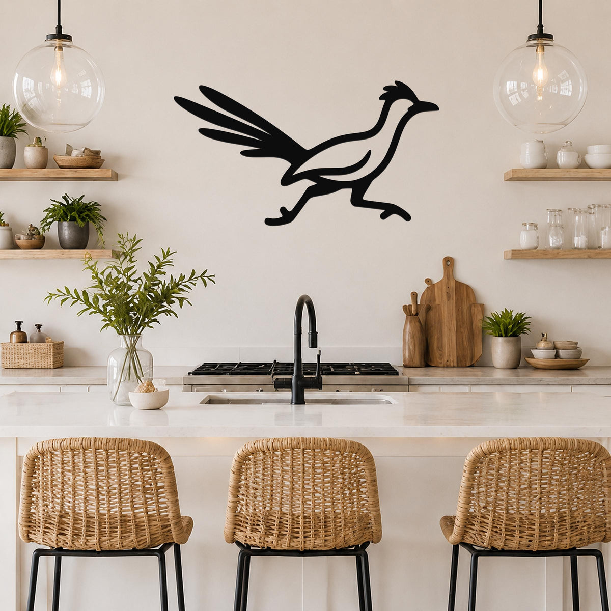 Black metal roadrunner wall art with motion-line cutouts, mounted above a kitchen counter in a modern kitchen.