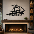 Black metal sailboat wall art with wave cutouts, mounted above a fireplace in a living room.