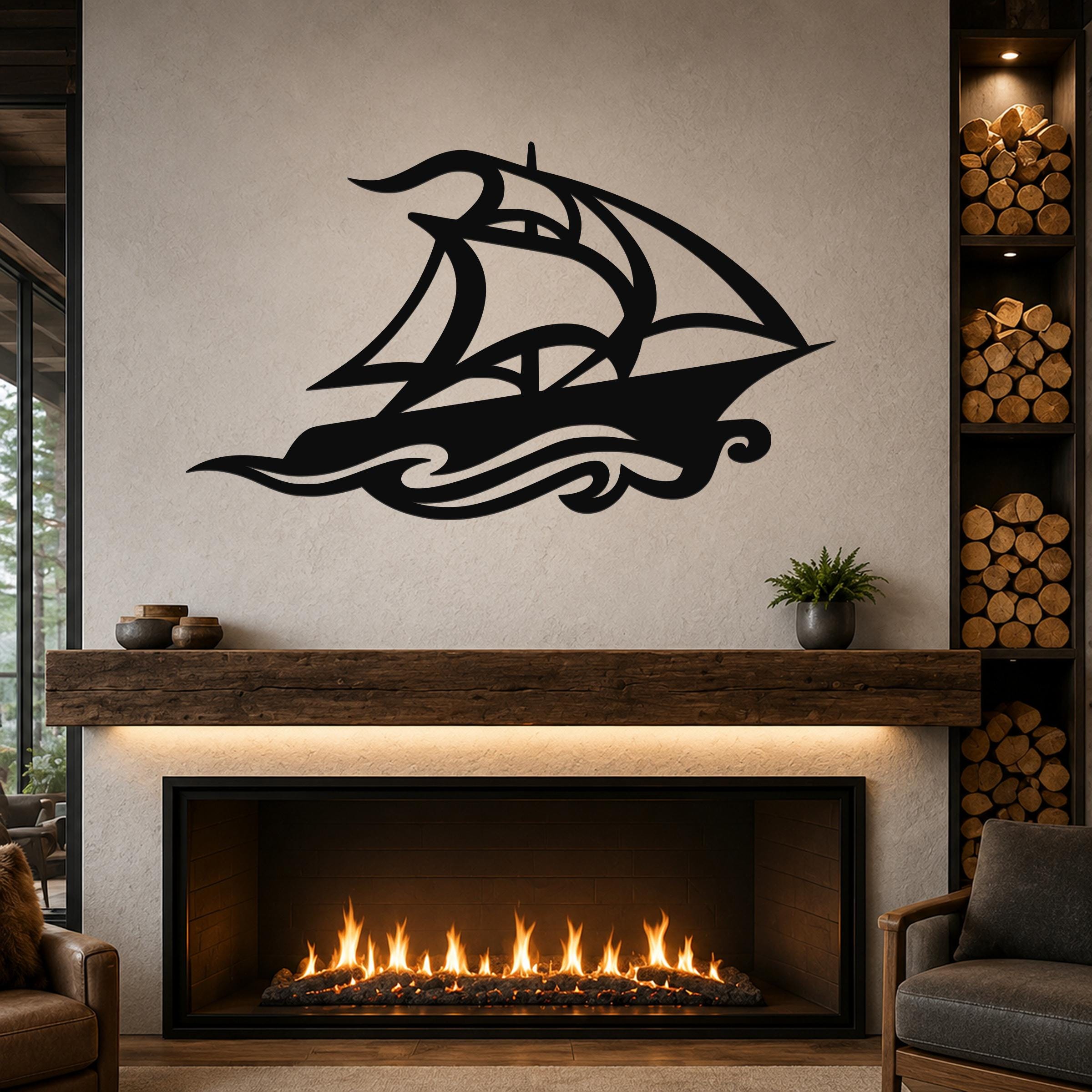 Black metal sailboat wall art with wave cutouts, mounted above a fireplace in a living room.
