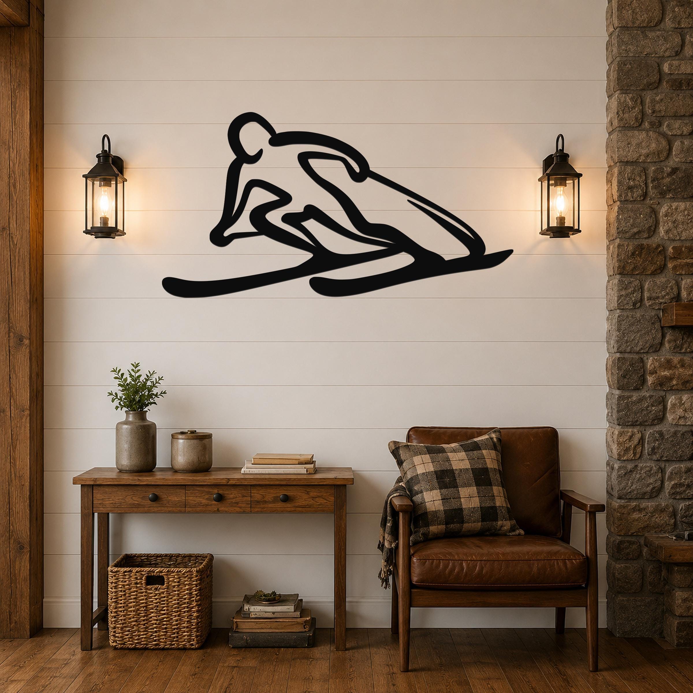Black metal wall art of a minimalist skier silhouette, mounted on a shiplap wall above a wooden console table in a living room.