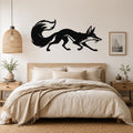 Black metal fox wall art silhouette with motion lines, mounted above a bed in a neutral bedroom.